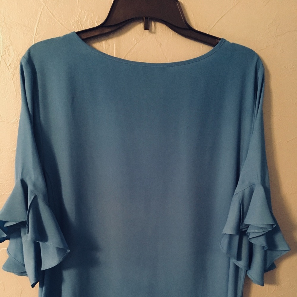 Beautiful majestic blue ruffled sleeve blouse